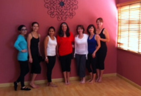Lynne Robinson with some of the graduates from a previous Doha course